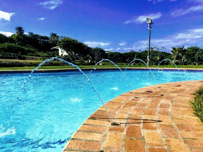The 18-metre resort swimming pool with fountain jets at Yellow Sands
