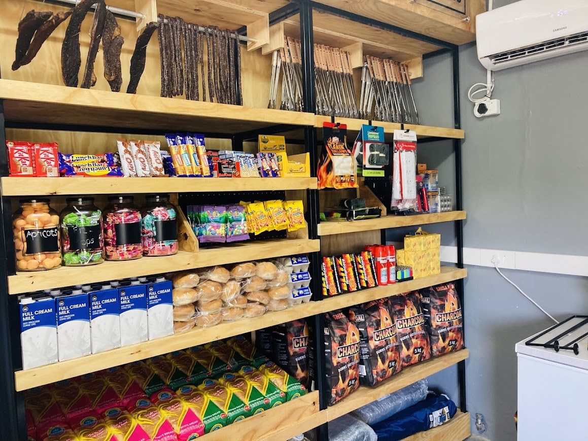 Well-stocked shelves in the Yellow Sands resort shop