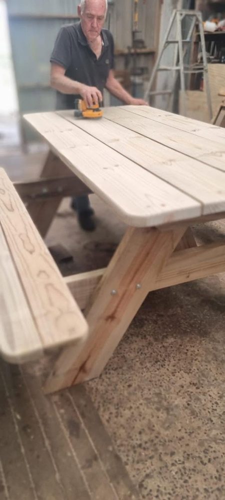 A new picnic table being built in the Yellow Sands workshop